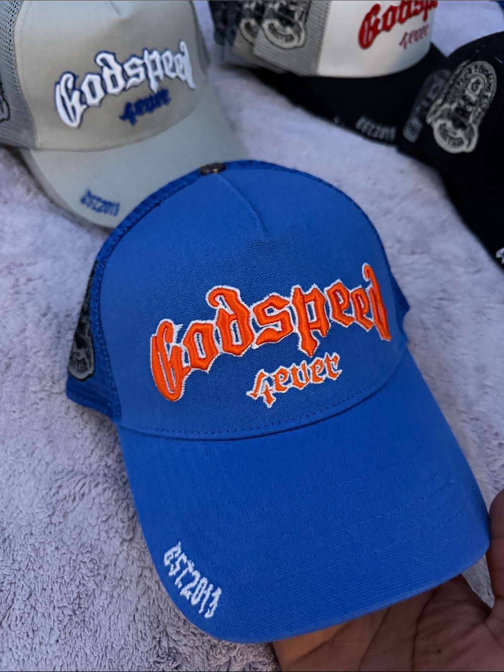 Godspeed Forever Blue Trucker Hat with Orange Embroidery
